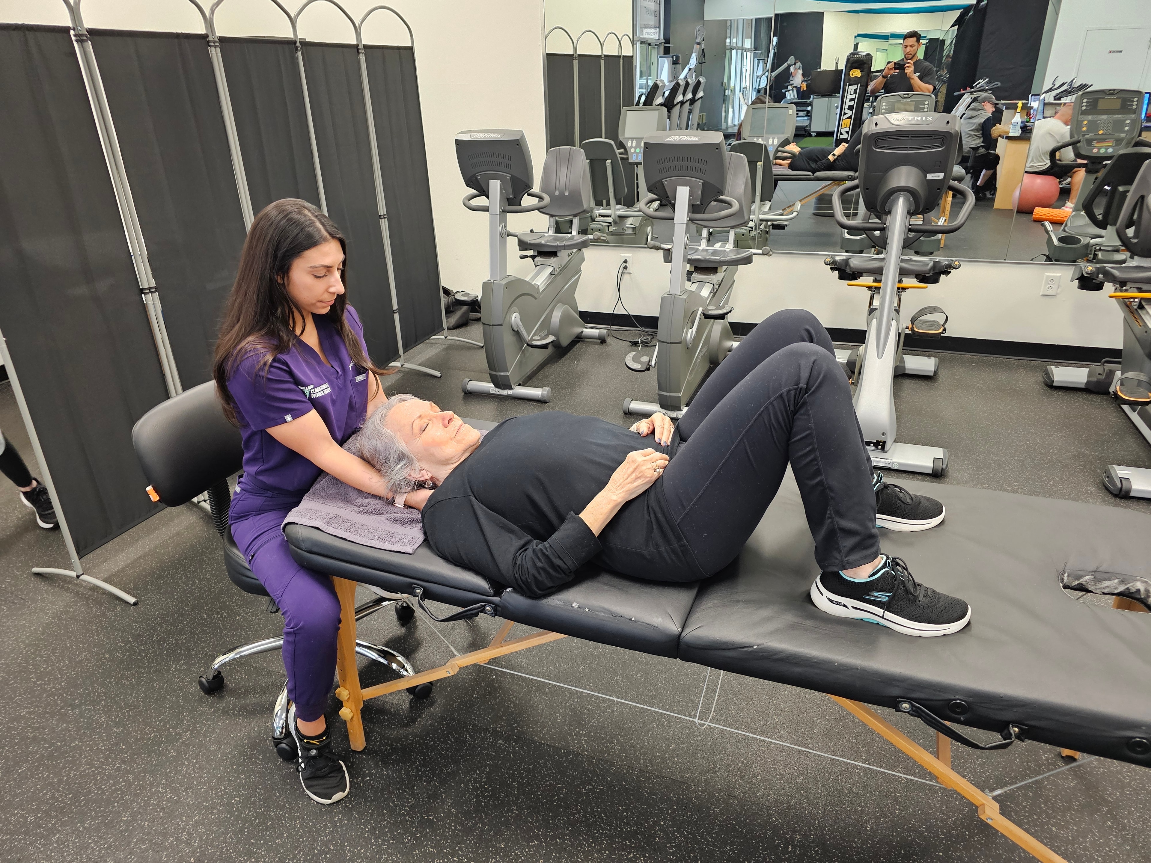 Clinician working with patient at Clinical Fitness PT